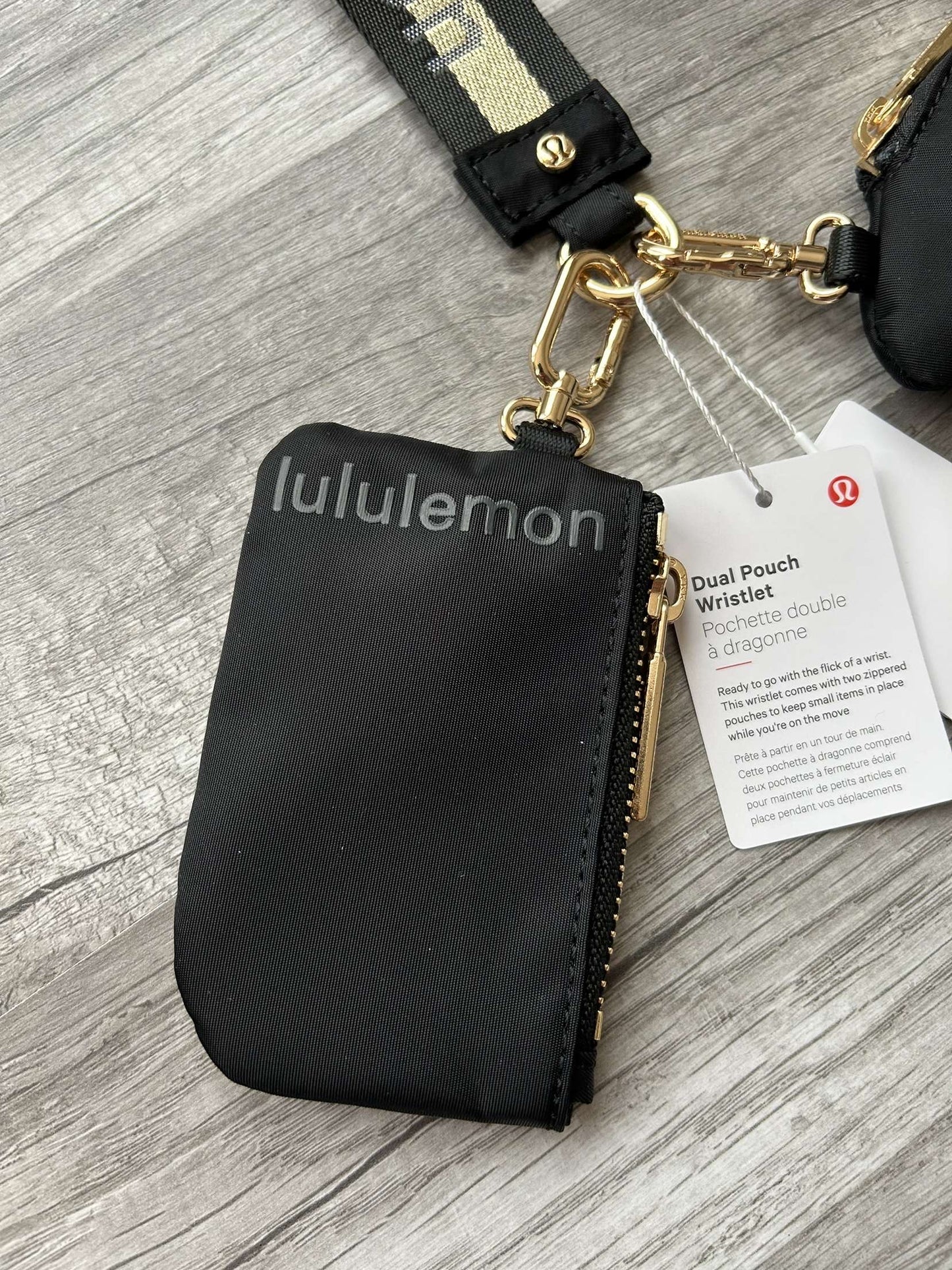 Lululemon Dual Pouch Wristlet Black and Gold Wordmark New With Tags