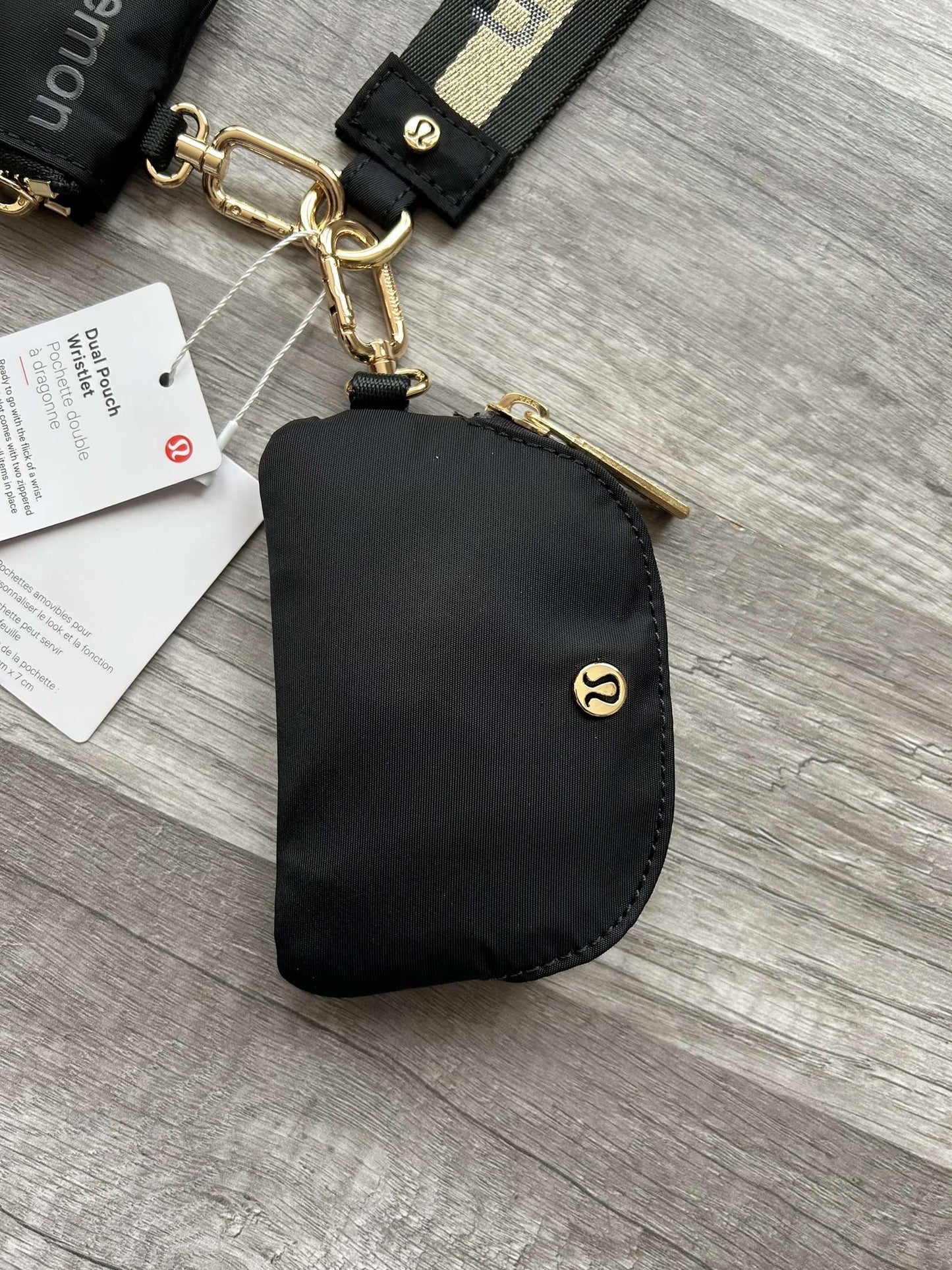 Lululemon Dual Pouch Wristlet Black and Gold Wordmark New With Tags