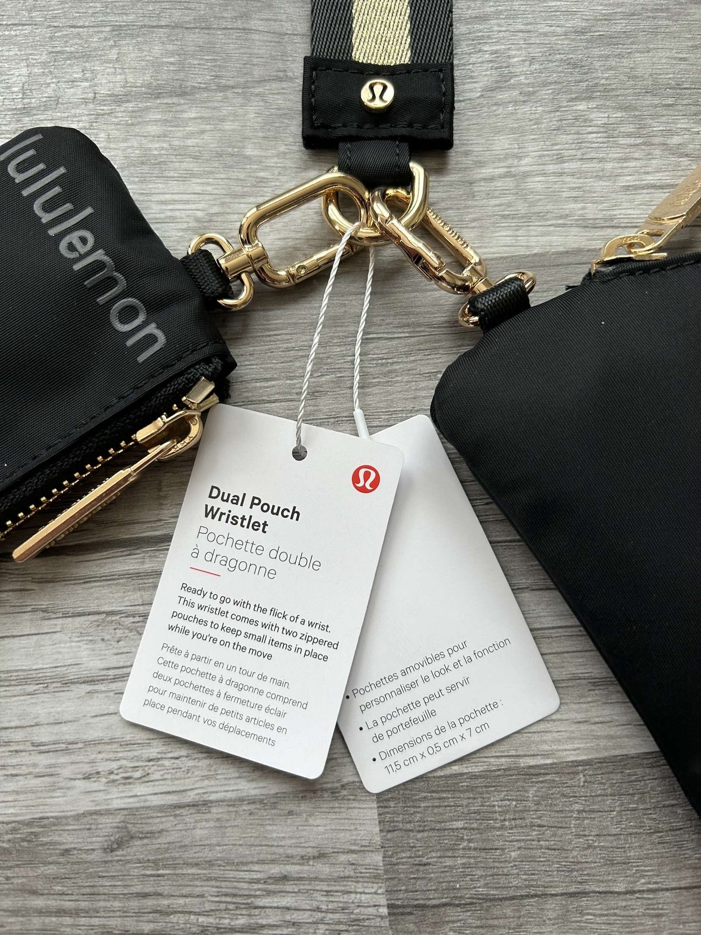 Lululemon Dual Pouch Wristlet Black and Gold Wordmark New With Tags