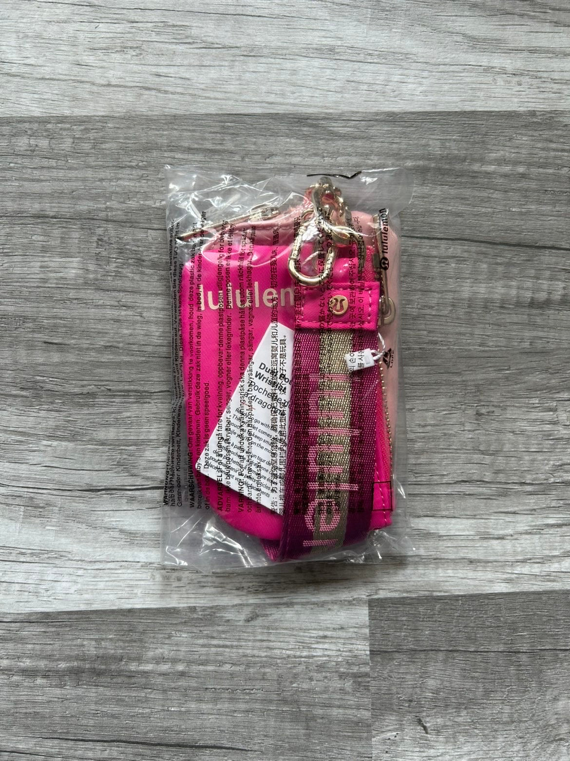 Lululemon Dual Pouch Wristlet Pink and Gold Wordmark New With Tags
