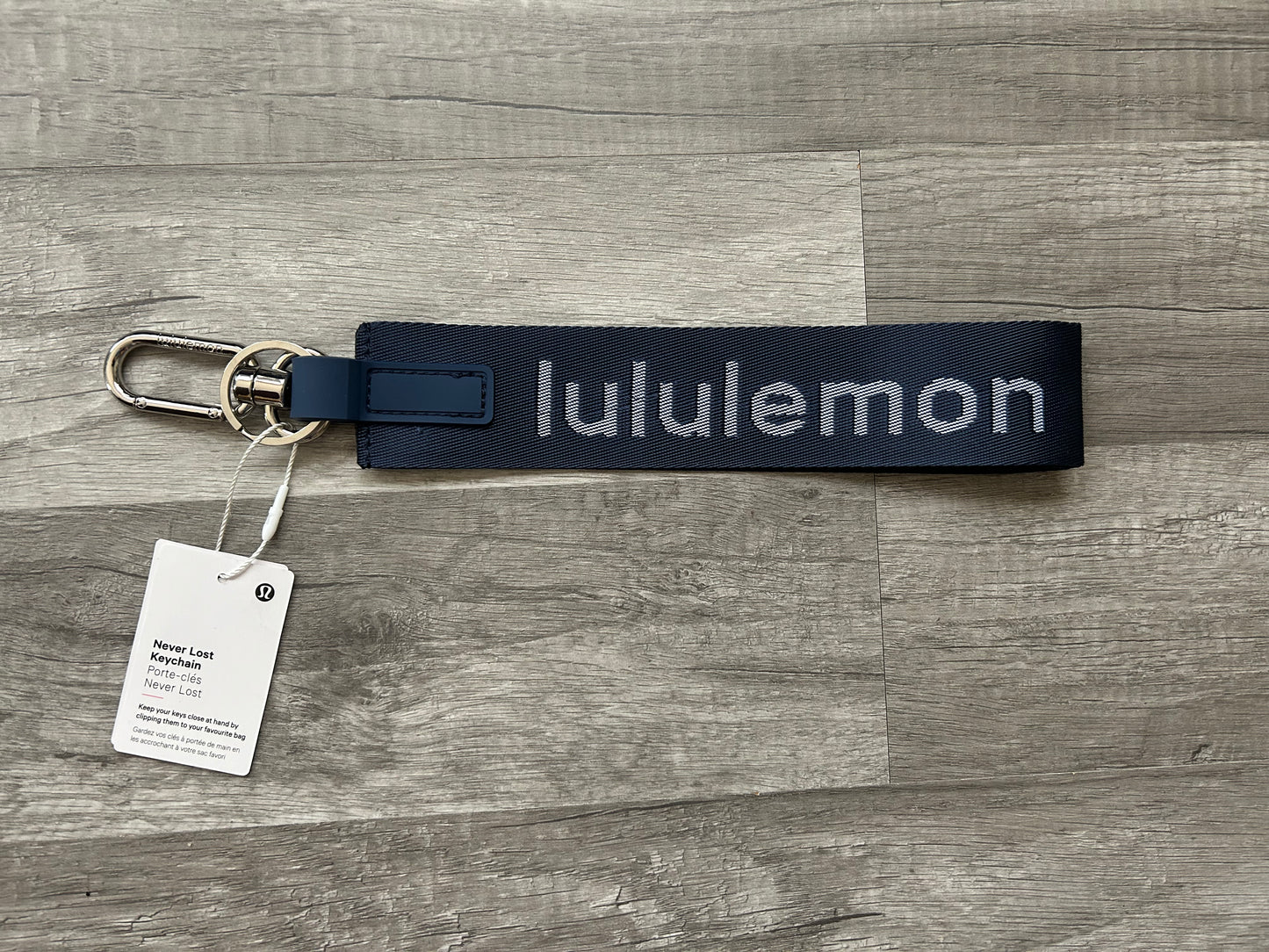 Lululemon Never Lost Keychain Navy Blue and White New With Tags