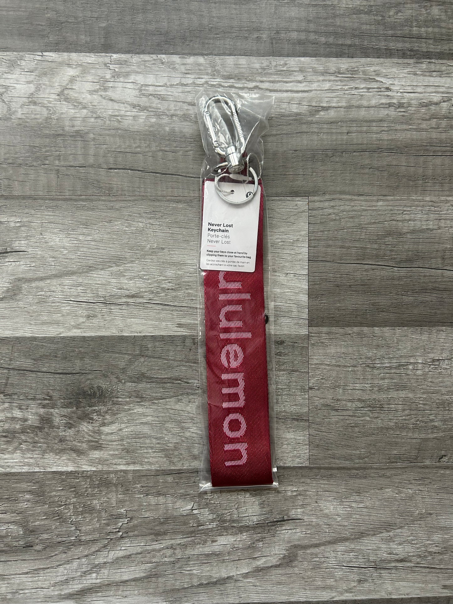Lululemon Never Lost Keychain Pomegranate Red and White New With Tags