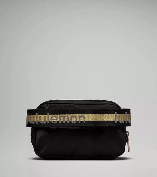 Lululemon Everywhere Belt Bag Black and Gold Wordmark New With Tags 1L
