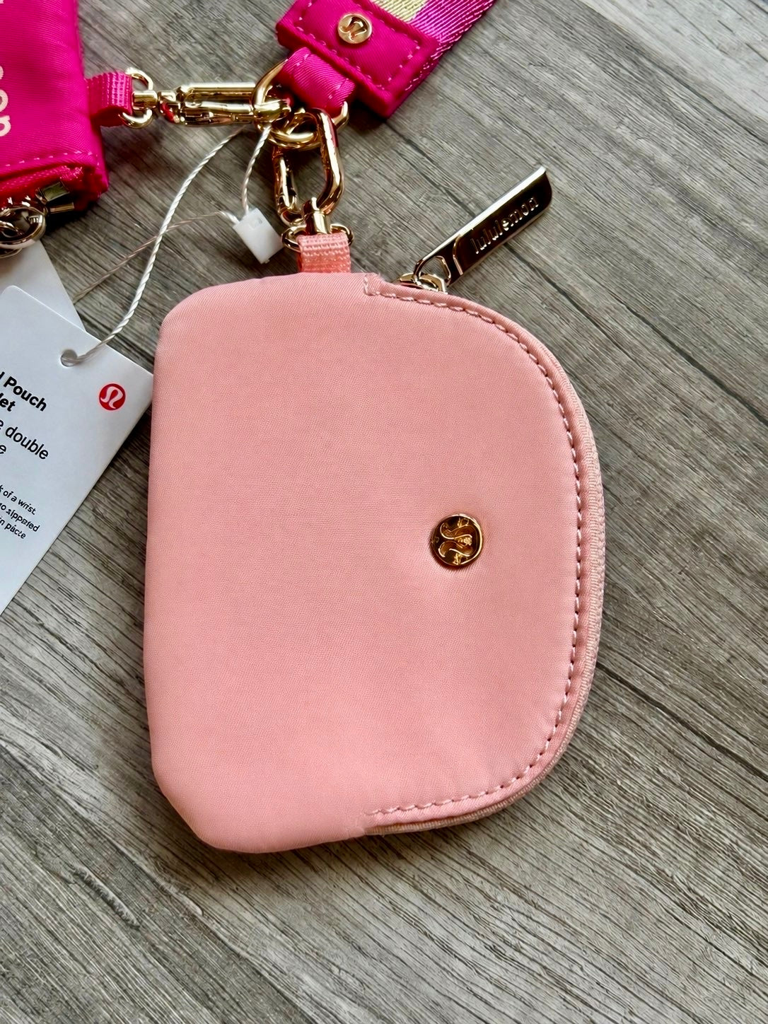 Lululemon Dual Pouch Wristlet Pink and Gold Wordmark New With Tags