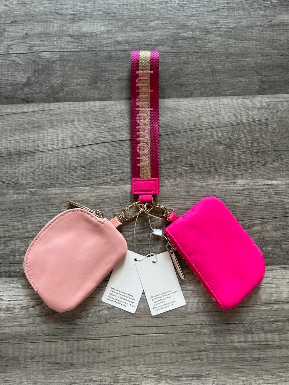 Lululemon Dual Pouch Wristlet Pink and Gold Wordmark New With Tags