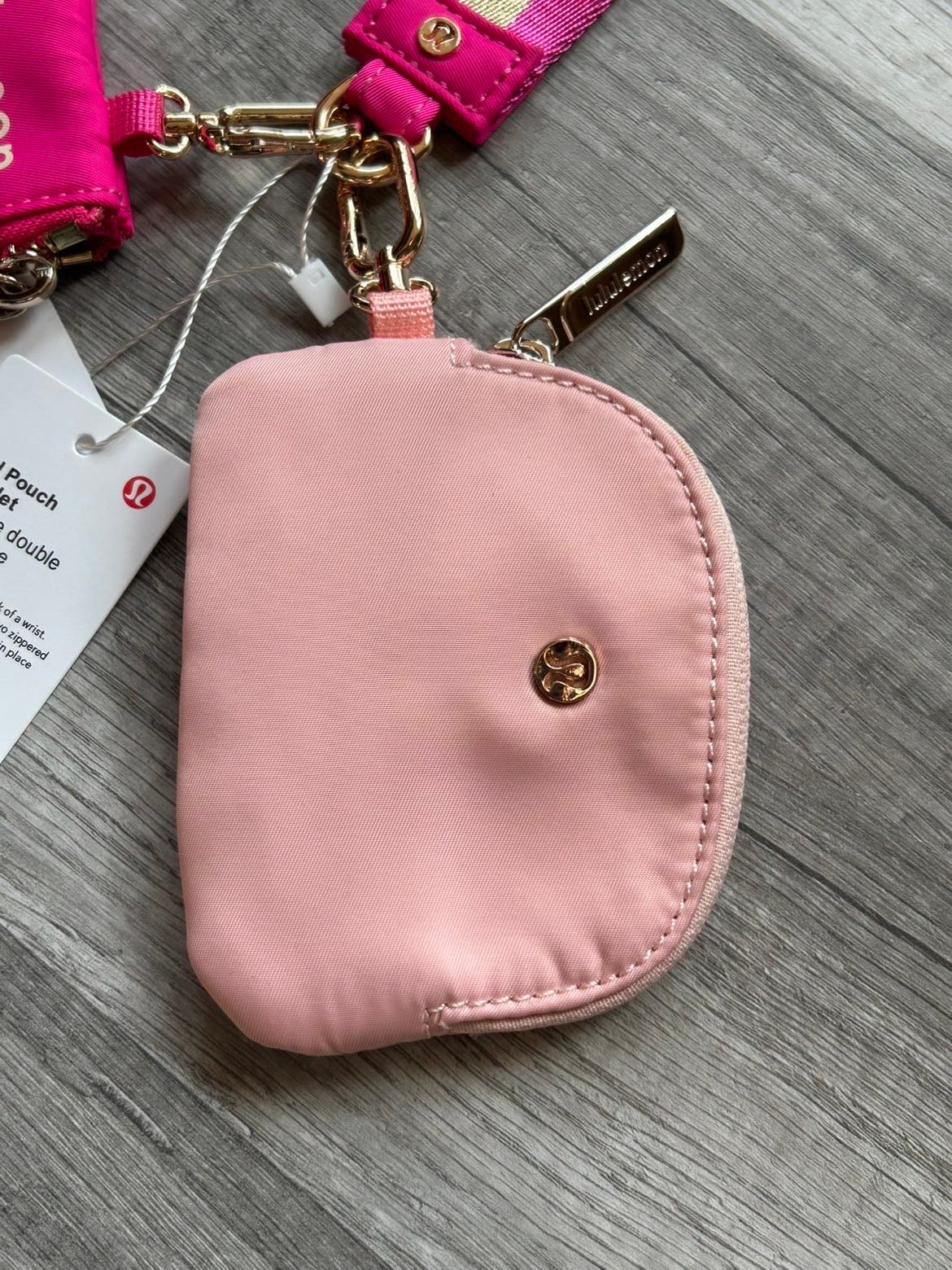 Lululemon Dual Pouch Wristlet Pink and Gold Wordmark New With Tags