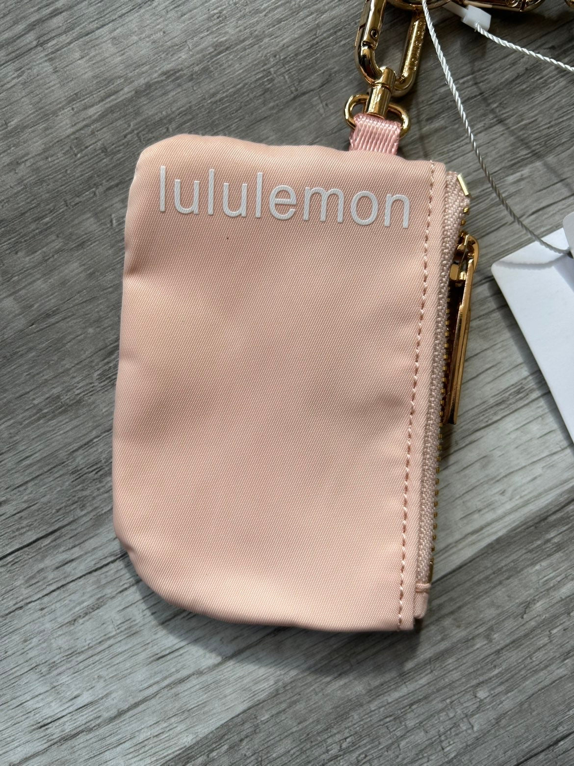 Lululemon Dual Pouch Wristlet Pink and White Gold Wordmark New With Tags