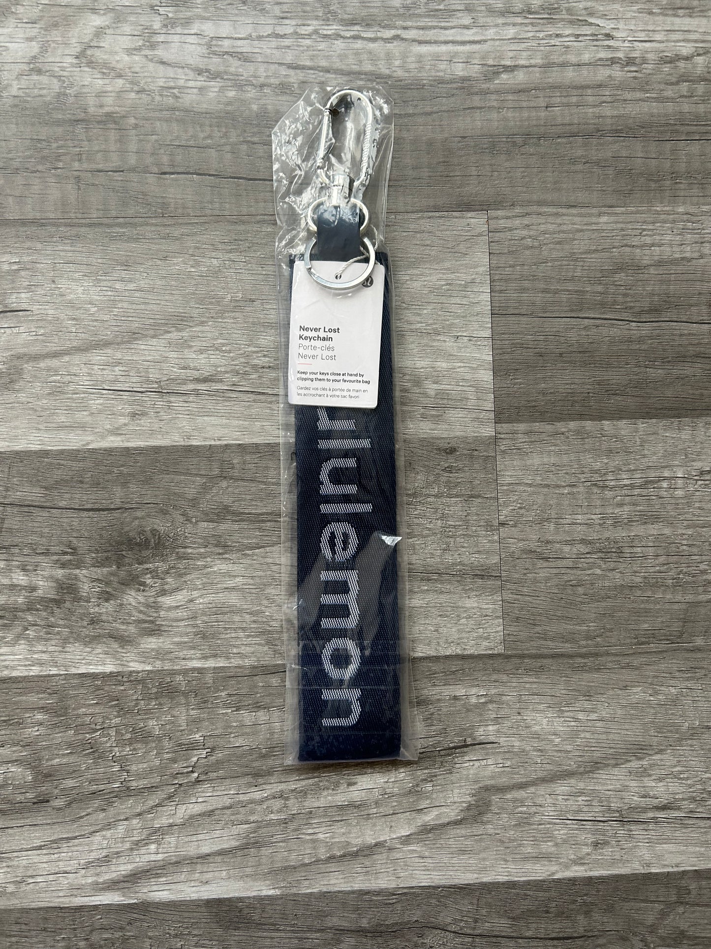 Lululemon Never Lost Keychain Navy Blue and White New With Tags