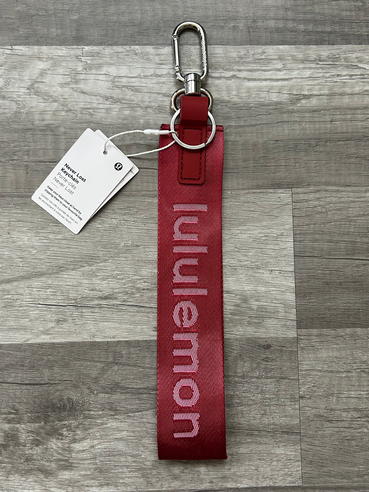 Lululemon Never Lost Keychain Pomegranate Red and White New With Tags